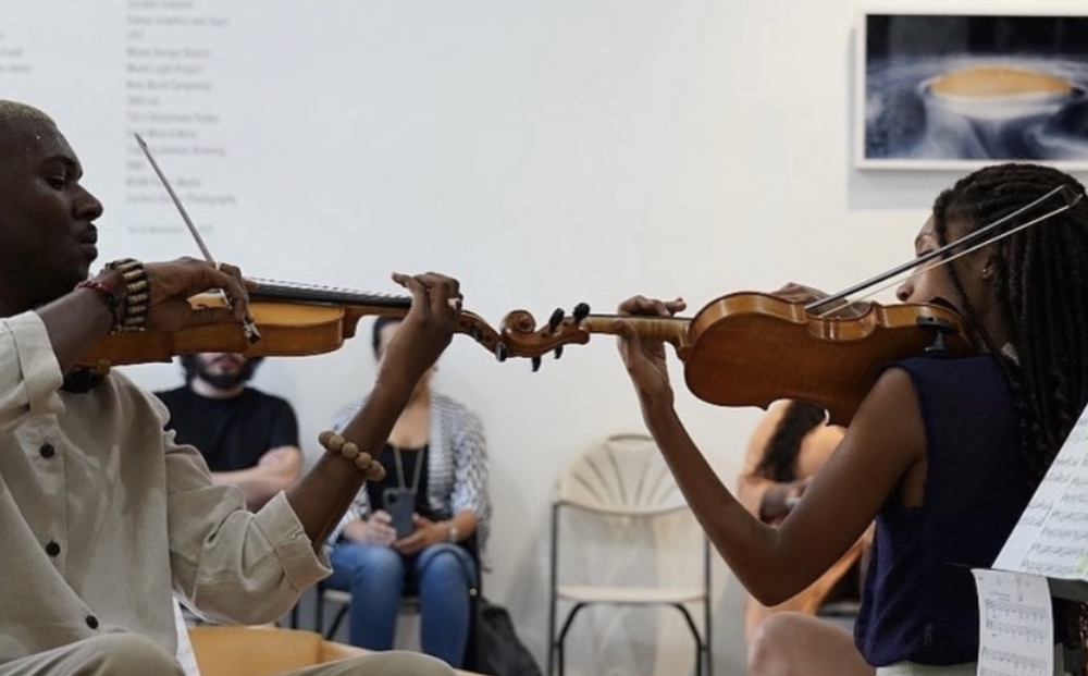 Lee Muze and Akio Gamma Playing Conjoined Violins