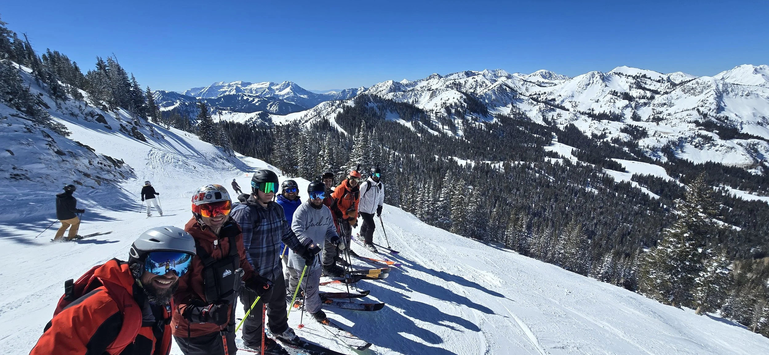 Group ski trip photo in the beautiful mountains of Utah.