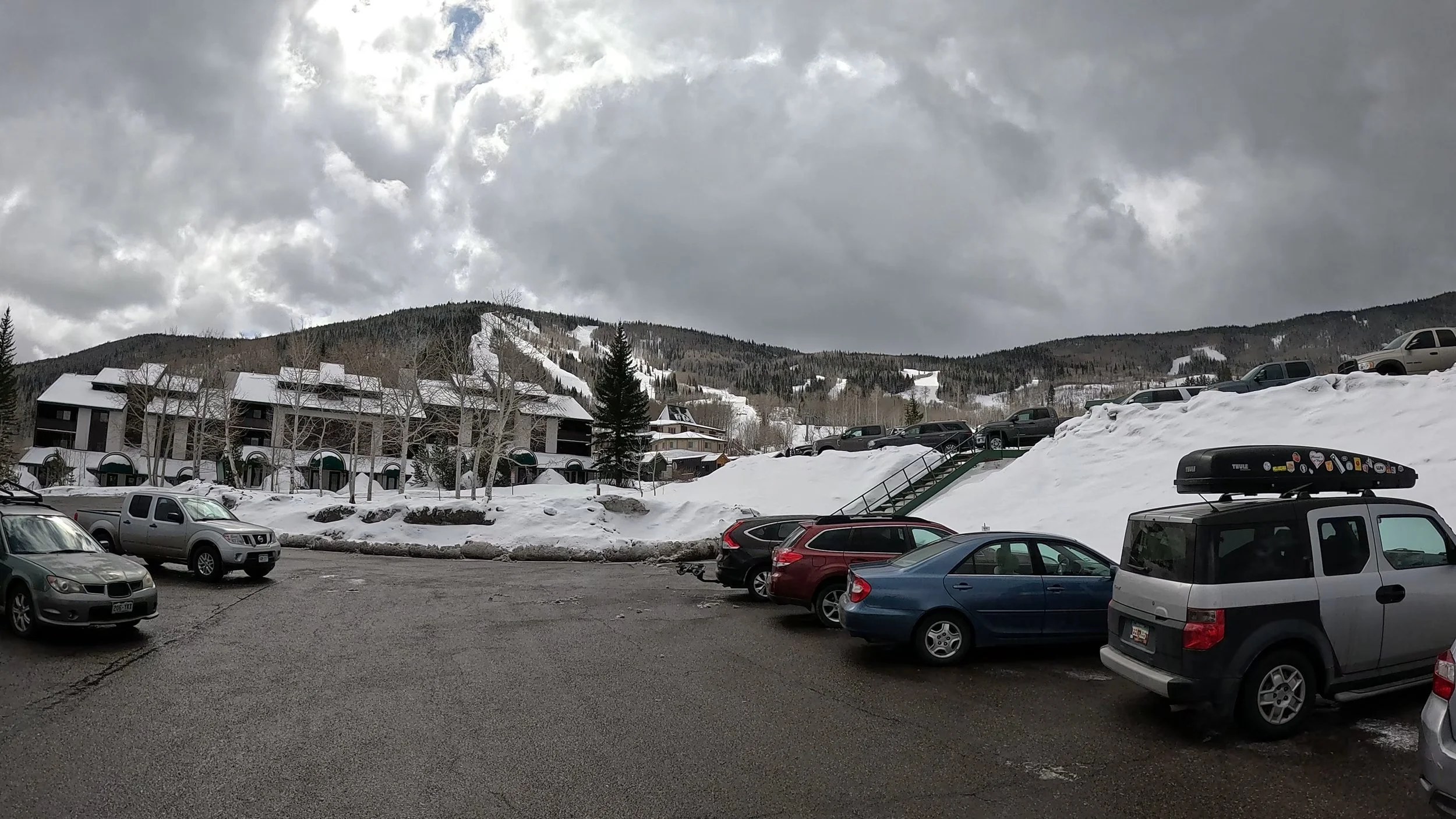 Condos at Powderhorn ski resort with the ski mountain in the background.