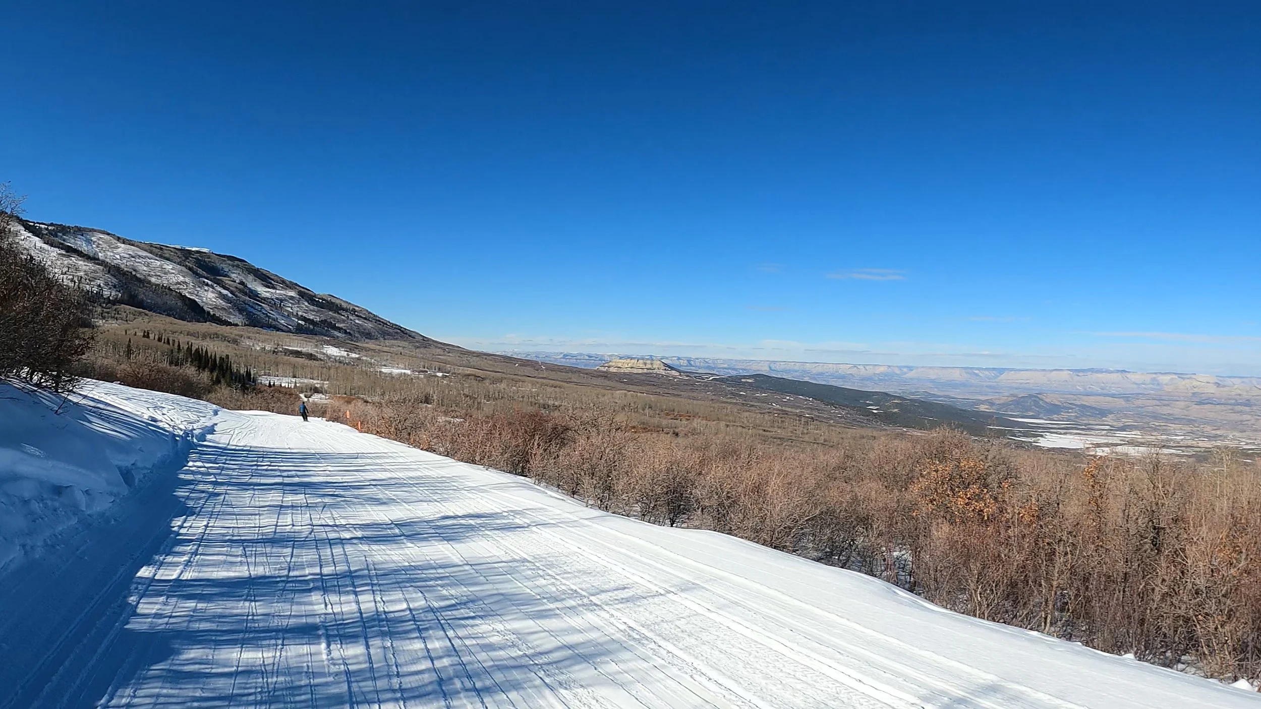 A flat ski trail with red rock views at Powderhorn ski resort.