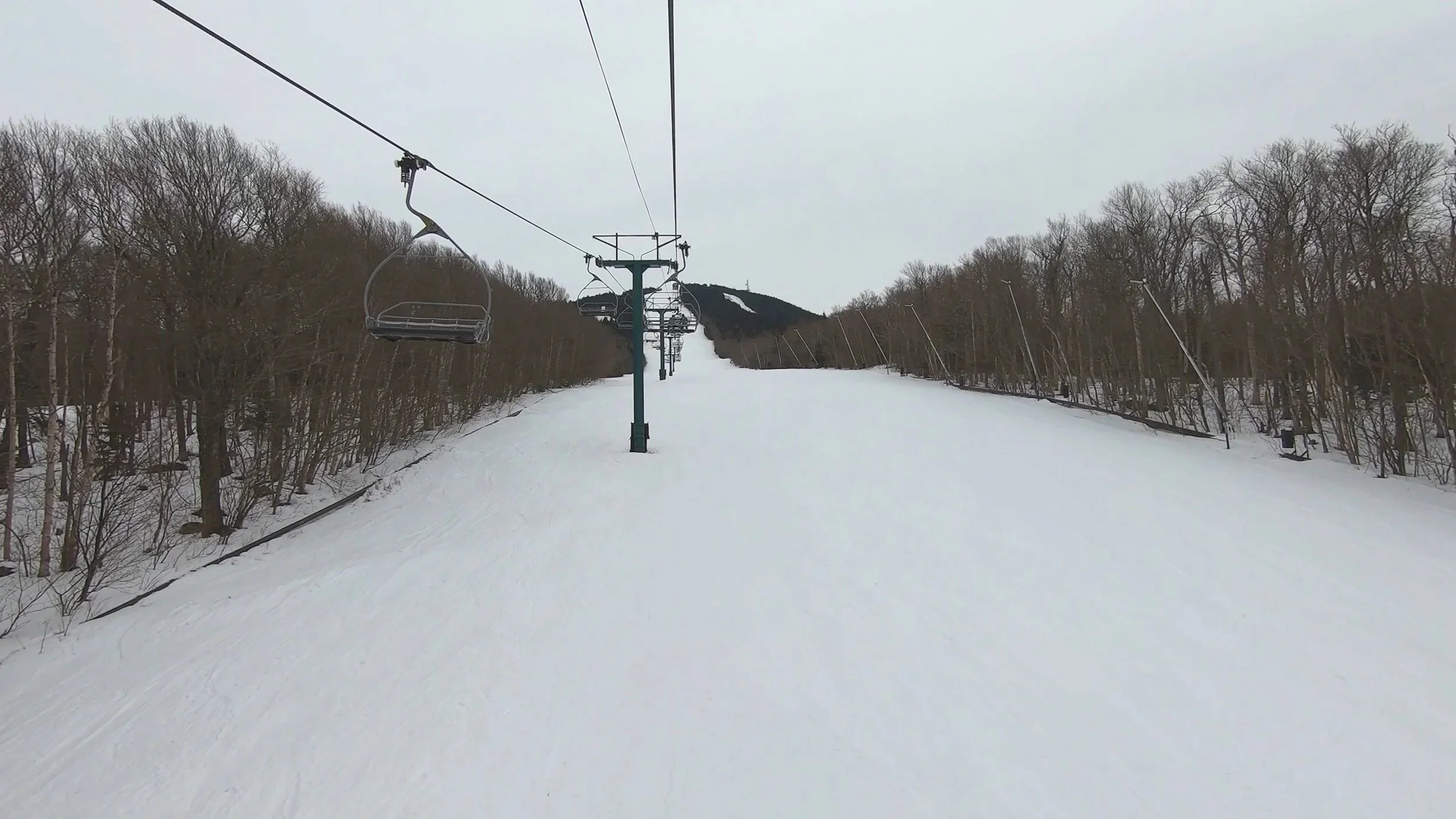 A ride up a Yan detachable ski lift at Pico mountain.