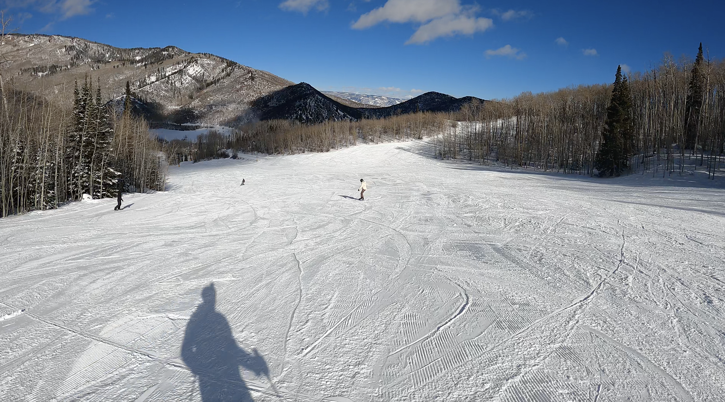 A wide uncrowded ski slope on a sunny day at Sunlight ski resort, Colorado