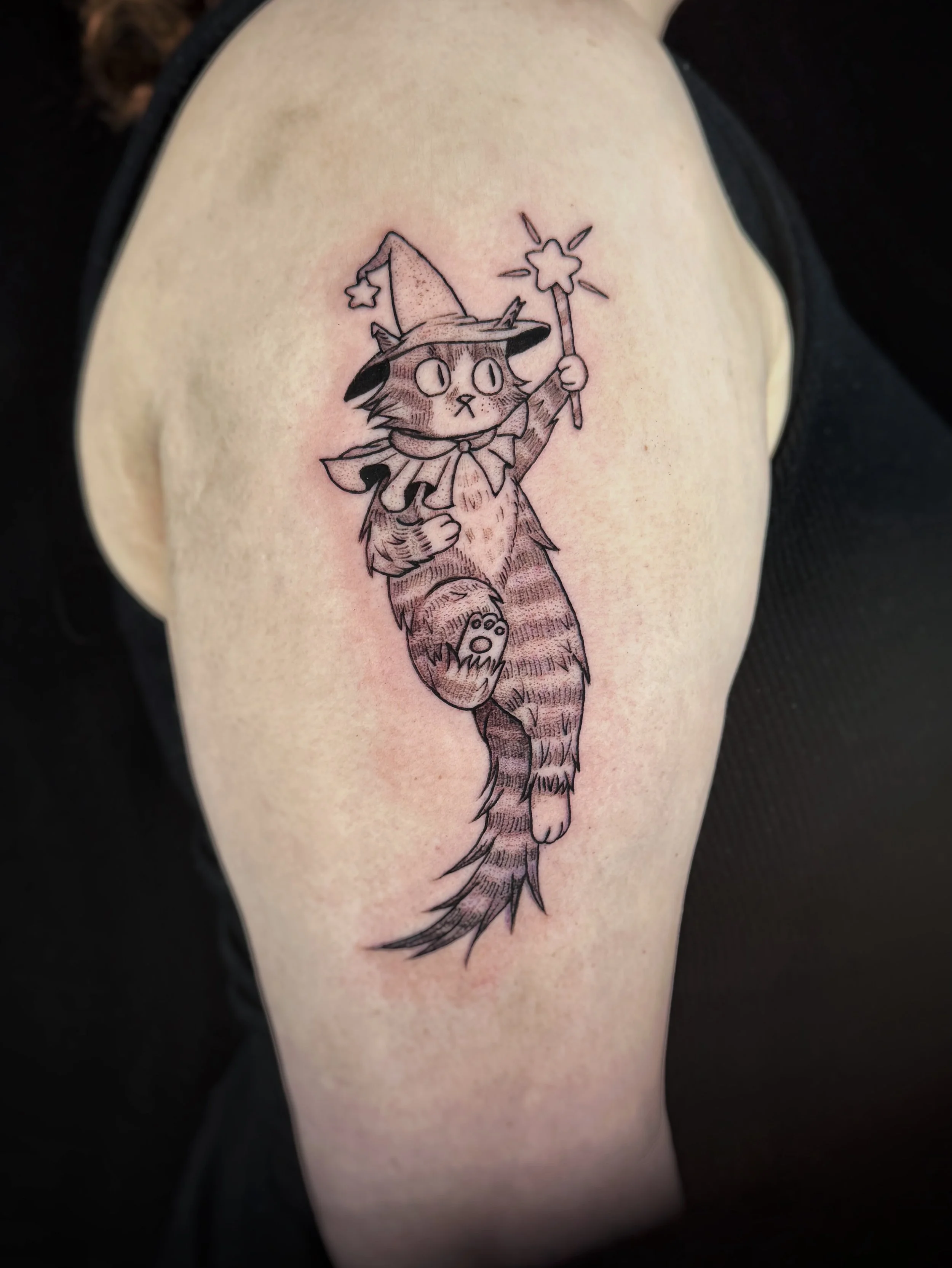 A wizard cat for Melanie!we added some stripes to make it look like her cat Kaiju! Thank you for trusting me with this! 🥹❤️ .
.
.
.
.

#oaklandtattooapprentice #bayareatattoo
#tattooapprentice #cattattoo 
#oaklandtattooartist