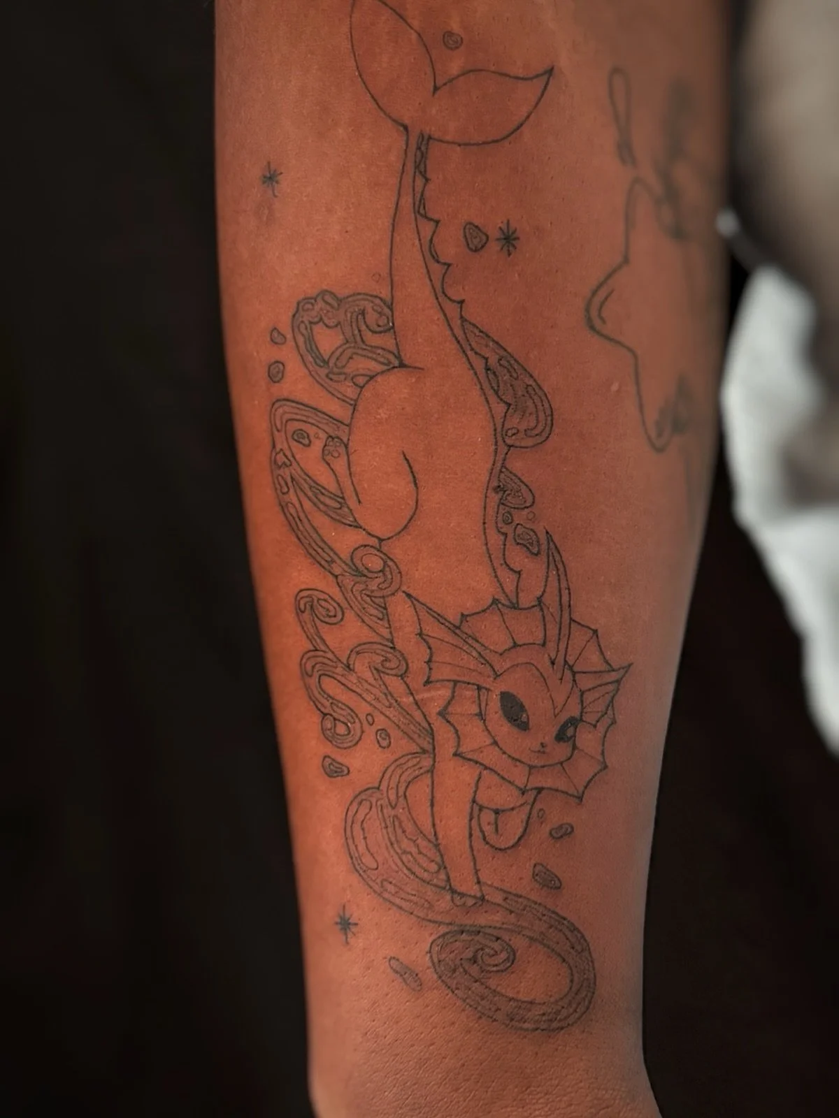 Vaporeon for one of my favorite clients @_remtime_ ❤️❤️❤️! Thank you so much Remi! I am not a water type Pokemon fan (fire type is better imo 💅) but I love how flowy water can be drawn ✨! 
.
.
.
.
.
.
.
#pokemontattoo #bayareatattoo
#sanfranciscotat