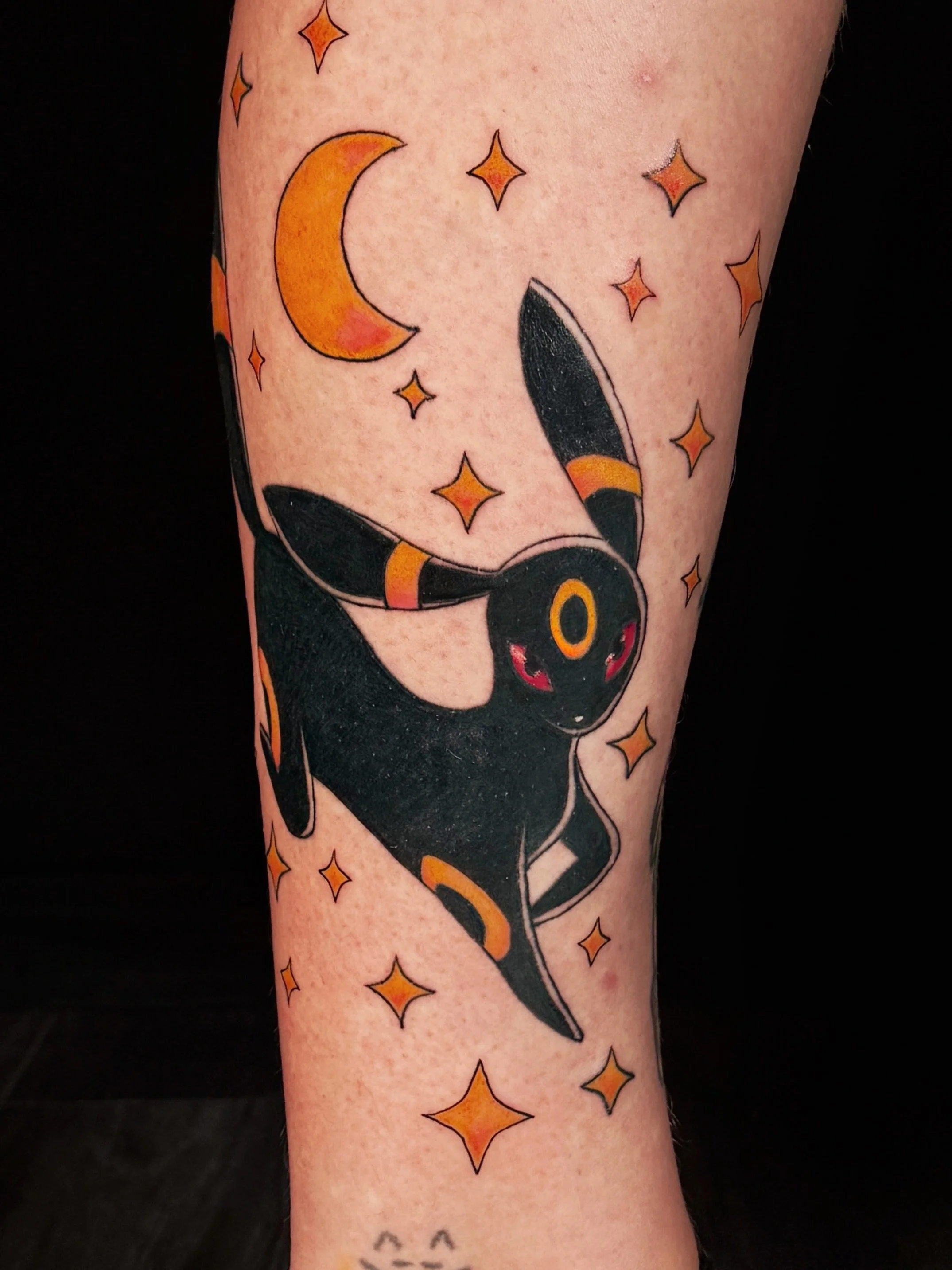 Colored Umbreon for @polyonymouspunk Thank you so much girrrrrl! Jupiter let me try do color for the first time ever 🥹❤️! I&rsquo;m gonna try and incorporate small colored ink in future projects 🥰! 
.
.
.
.
#pokemontattoo #bayareatattoo
#oaklandtat