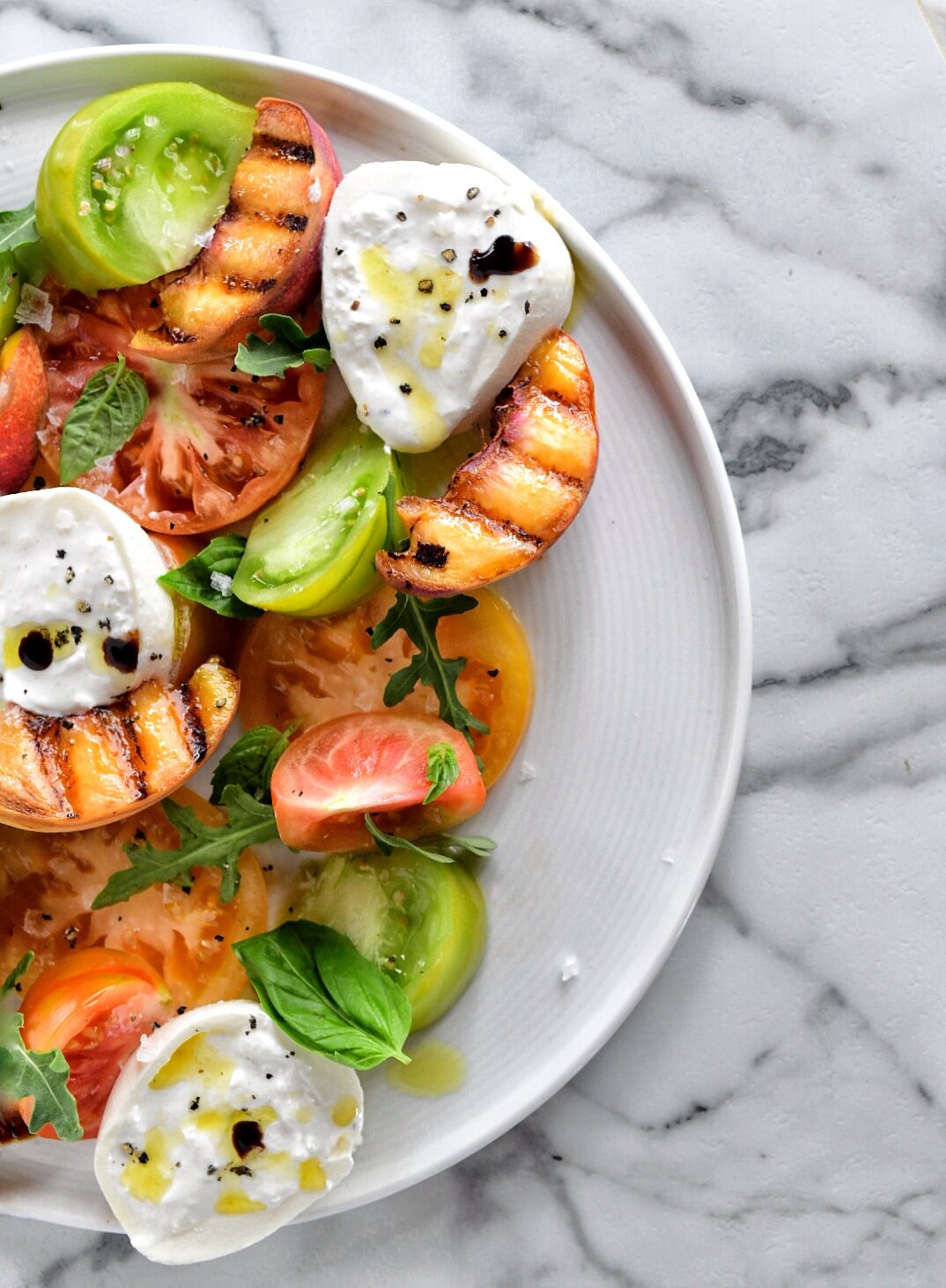Grilled peach, heirloom, burrata salad