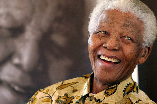 portrait-of-nelson-mandela-smiling-136381074277202601-130718102930.jpg