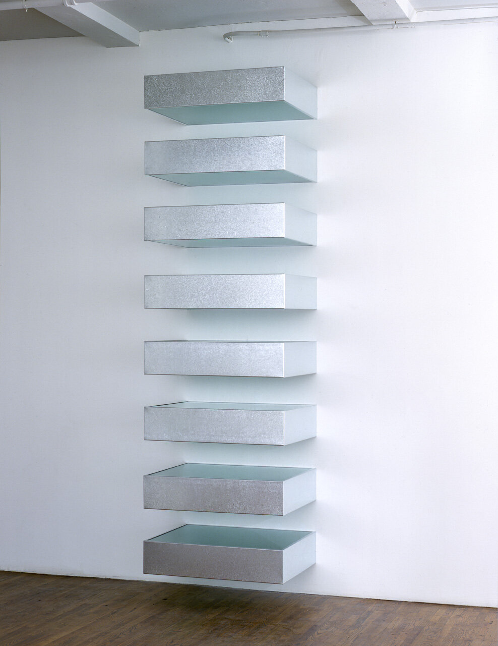  Donald Judd , u ntitled, 1987, galvanized iron, green acrylic sheets, 10 units, each: 9 x 40 x 41 in.; overall: 171 x 40 x 41 in.; installation view,  Changing Group Exhibition , Paula Cooper Gallery, New York, January 20 – January 30, 1988. Photo: 