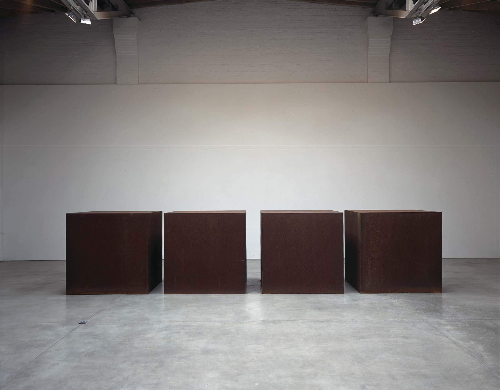  Donald Judd, untitled, 1975, cold rolled steel, 4 units, each: 5 x 5 x 5 ft. (1.52 x 1.52 x 1.52 m); installation view,  Group Exhibition: Sculptures and Drawings , Paula Cooper Gallery, 534 W 21st Street, New York, July 14 – August 28, 1998. Photo: