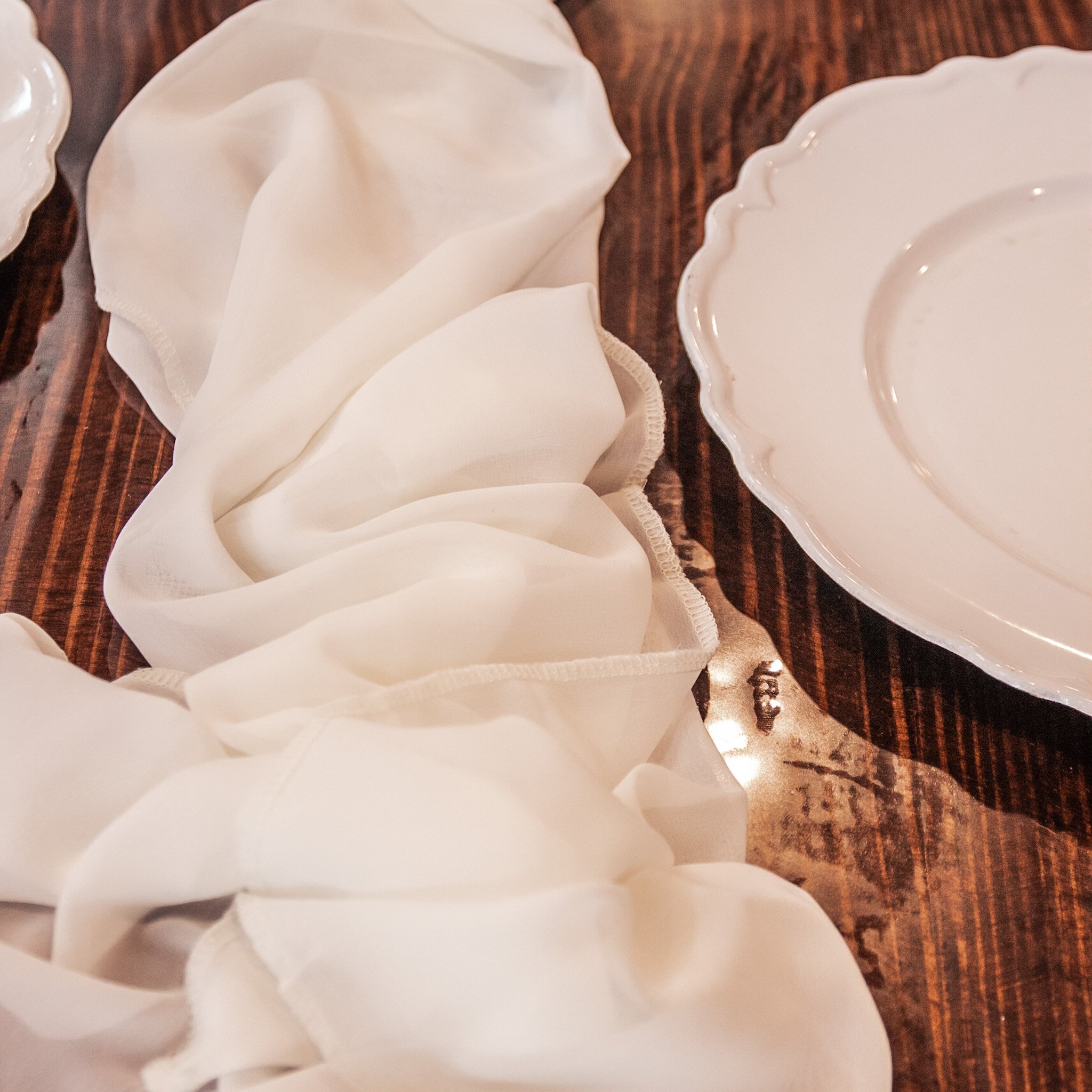 Ivory table runner on farmhouse table