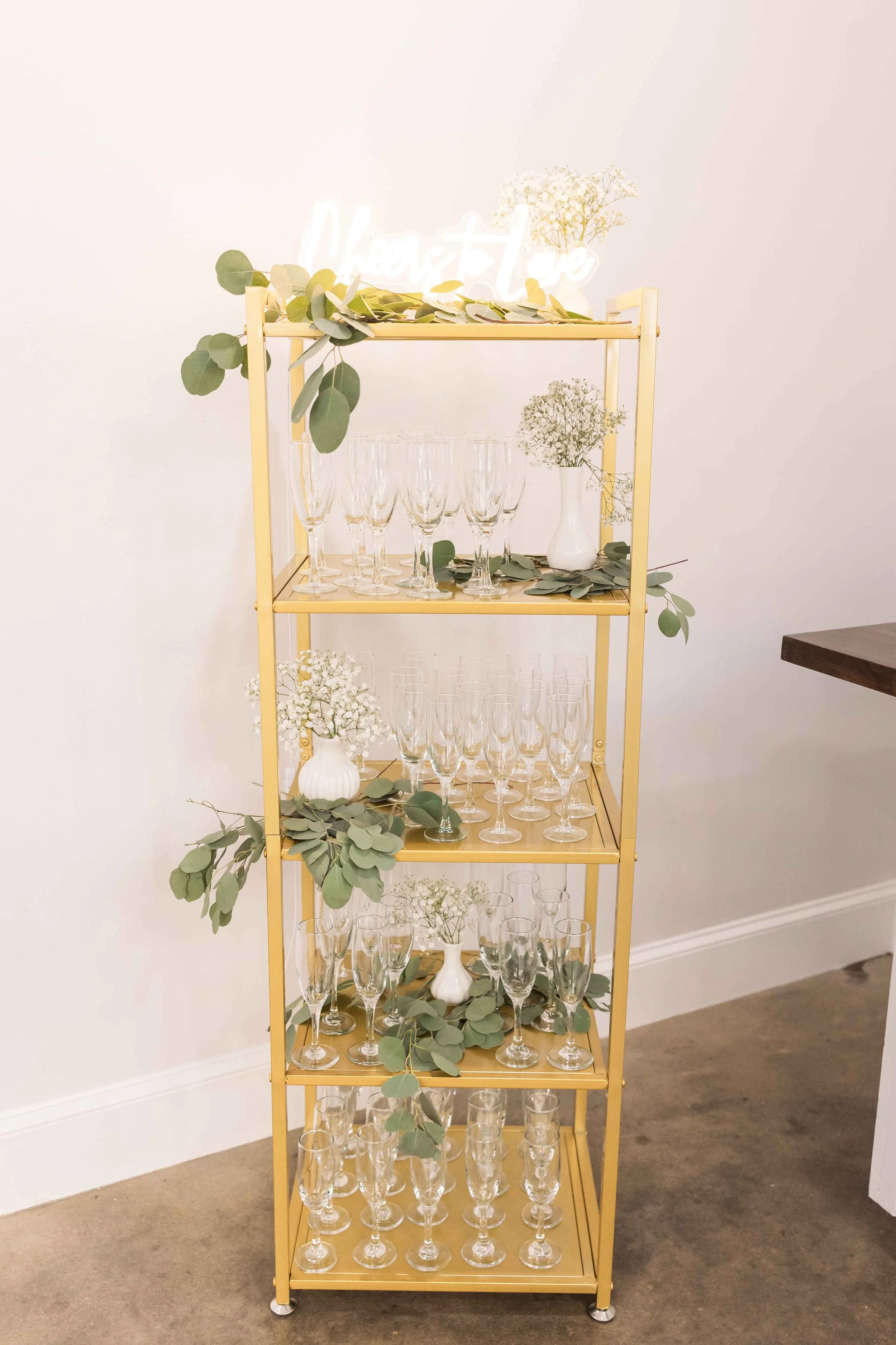 shelf with wedding champagne