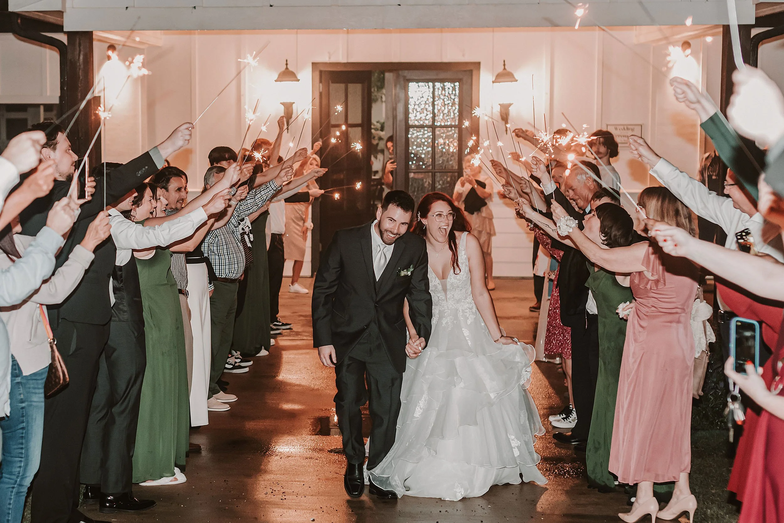 wedding night sendoff with sparklers at sunset oaks