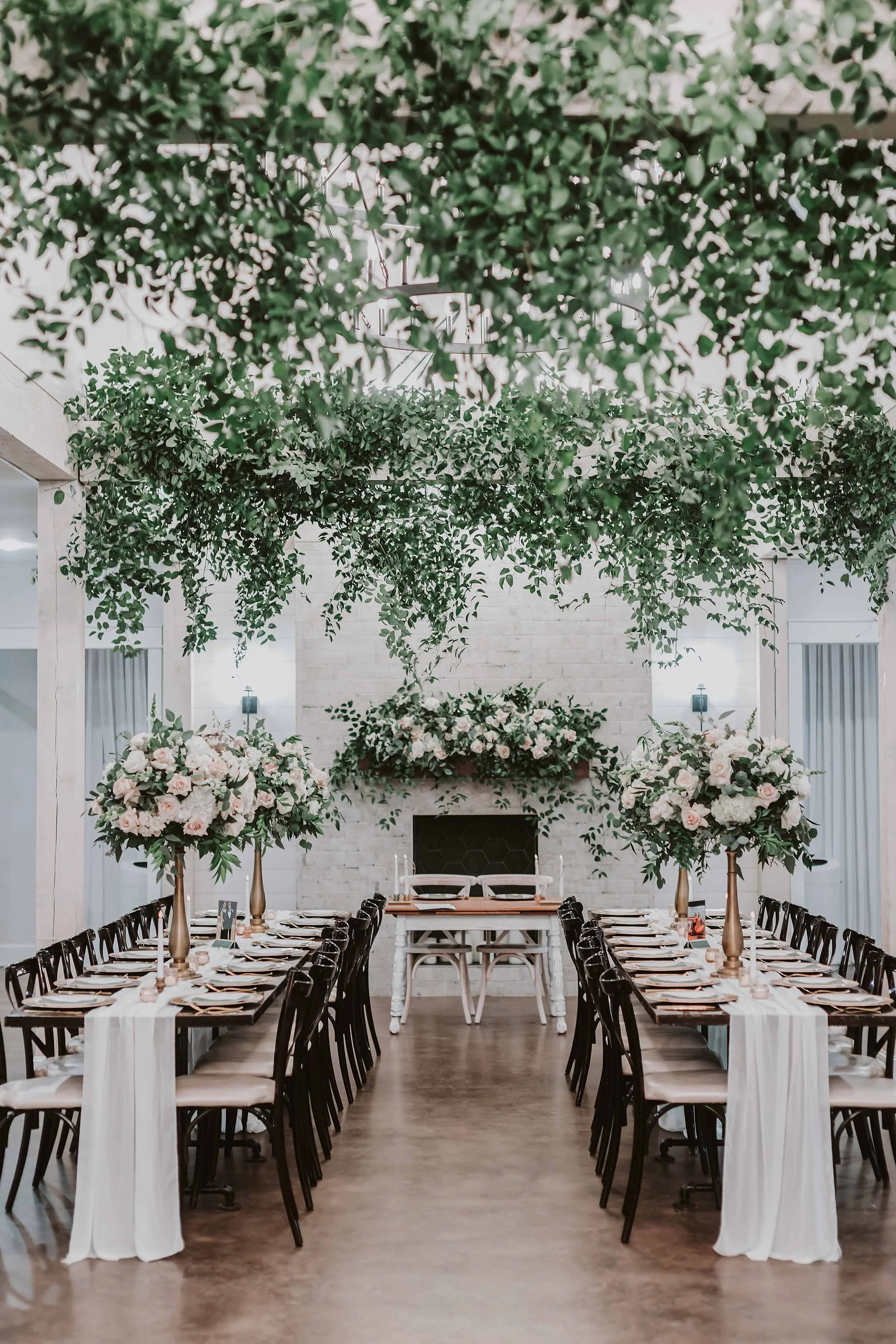 elegant wedding reception in tyler tx with flowers and greenery