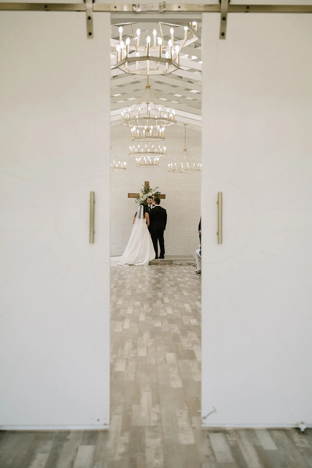 bride and groom at the altar in the wedding chapel