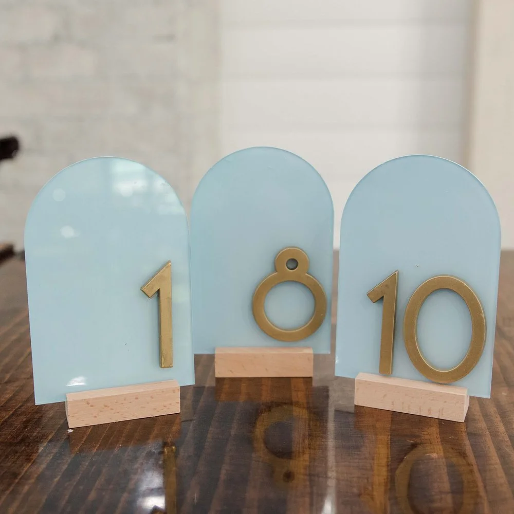 blue hand made table numbers