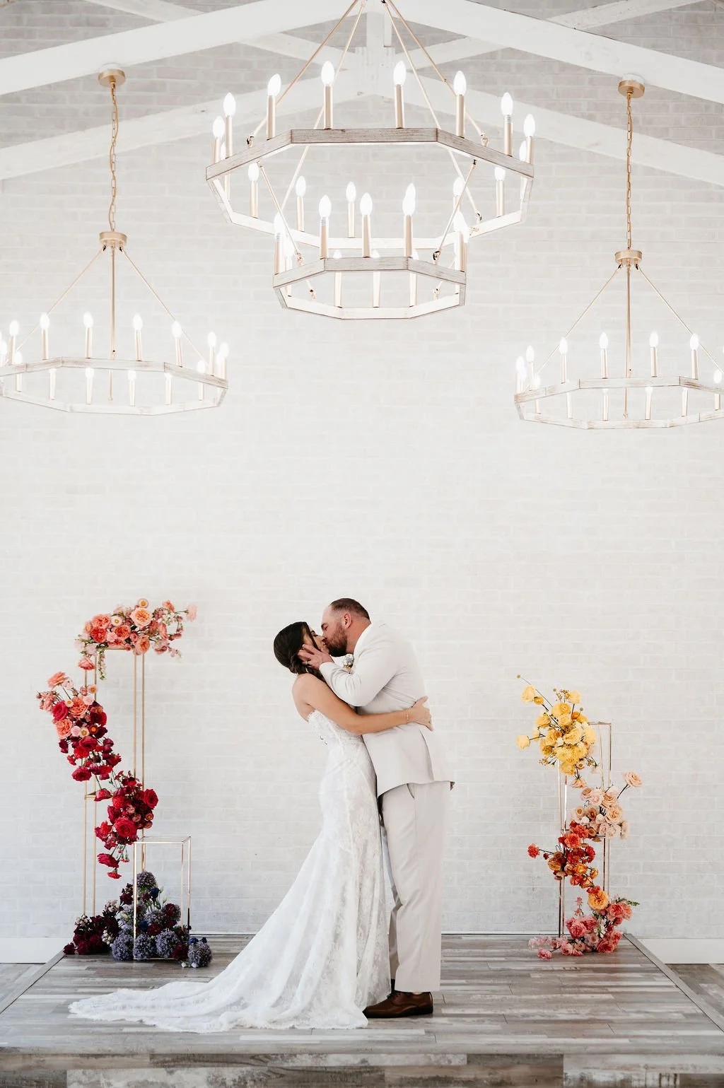 bride and groom eloping in white chapel