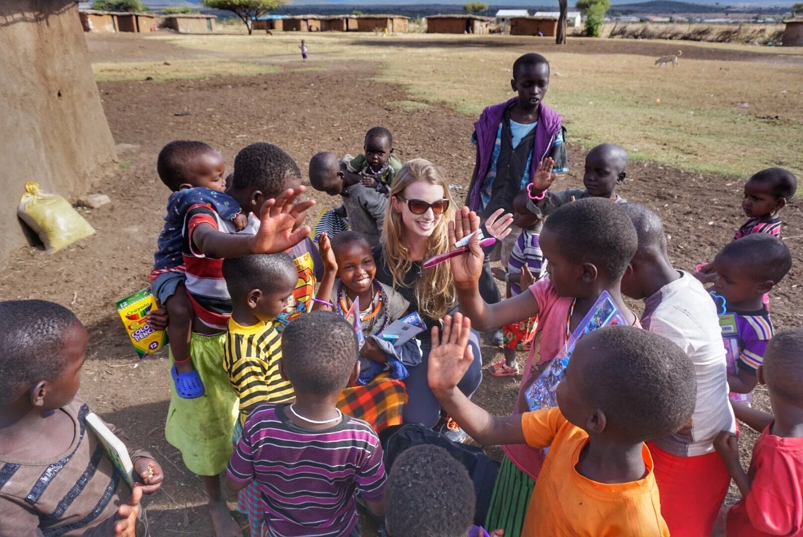 Brittany and children high five.jpeg