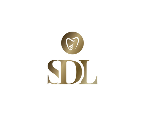 “SDL orthodontic logo with gold tooth graphic and letters SD and L – branding for dental and orthodontic training collaboration.”