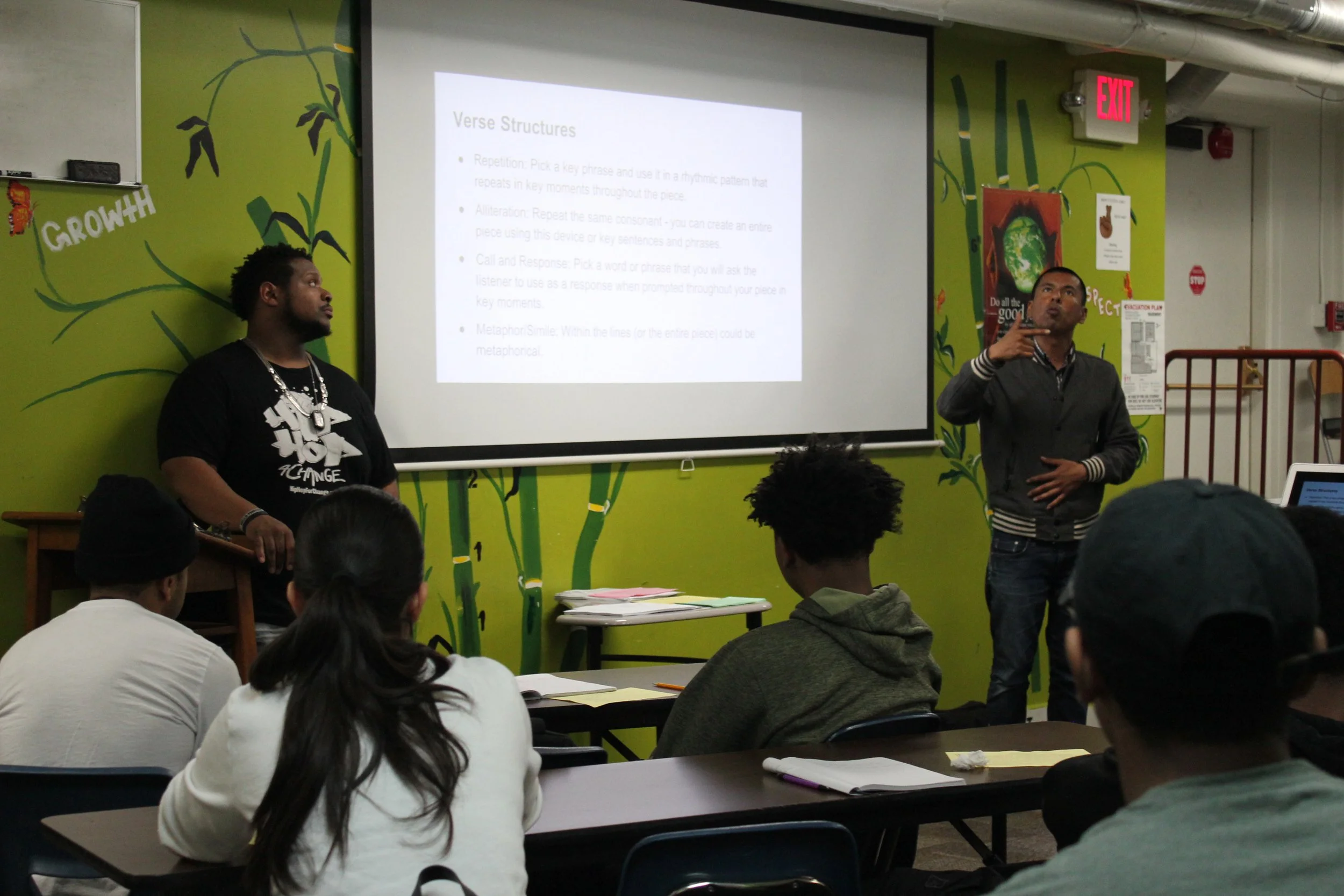 Teaching artists Marlon Richardson and Carlos Aguirre conduct in-class writing workshops where the task is to use the free writes and brainstorms collected on-site at the Alameda Court House to create rap, poetry, or spoken word verses and choruses. 