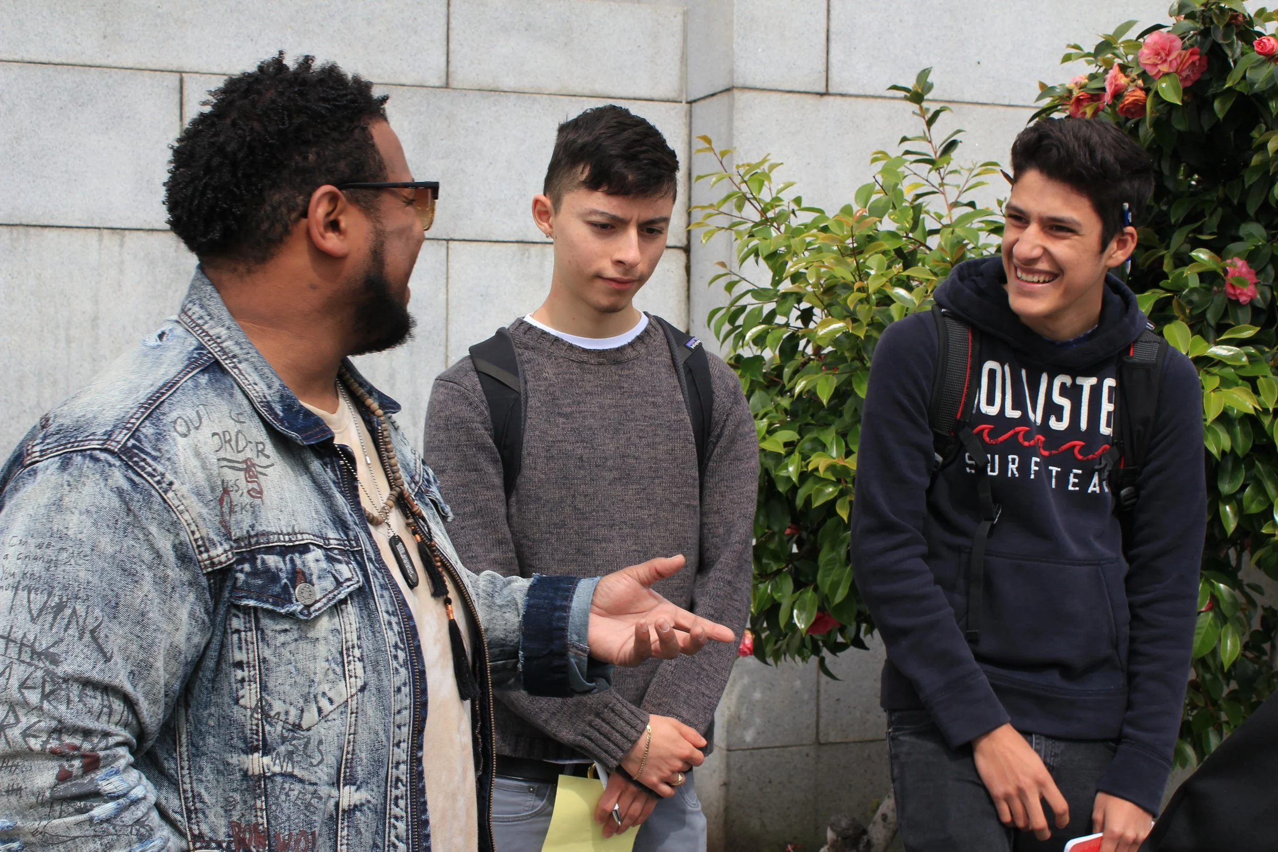 He speaks with them about the human voice being melodic and percussive, and how the process of rhyme and repetition connects us to our ancestors. 