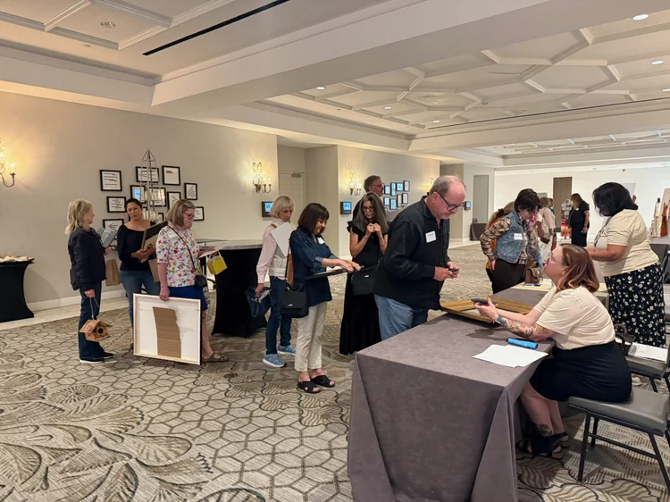 Guests browsing the silent auction