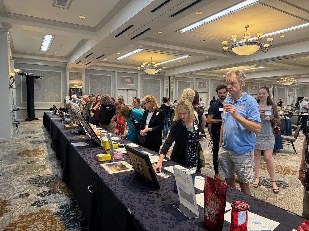 Guests filling the room at the Caring for Critters Brunch