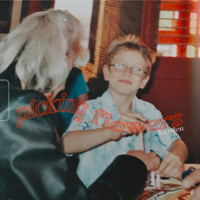 Kayden - picking flowers