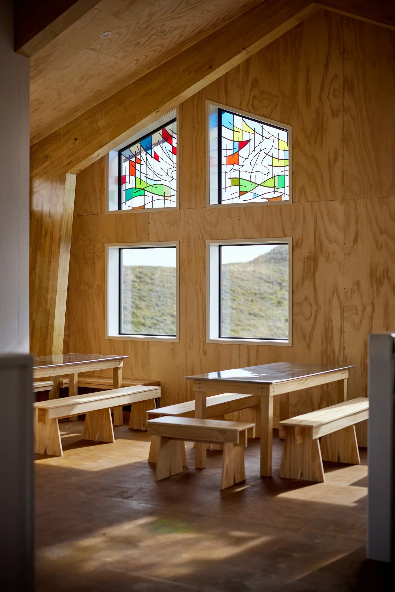 Perched high on the Pouākai ranges, a new hut stands where many have sought shelter before.

Co-designed with Ngāti Tairi and Ngā Mahanga, Pynenburg &amp; Collins designed the new Pouākai Hut, providing a haven for trampers and day visitors braving T