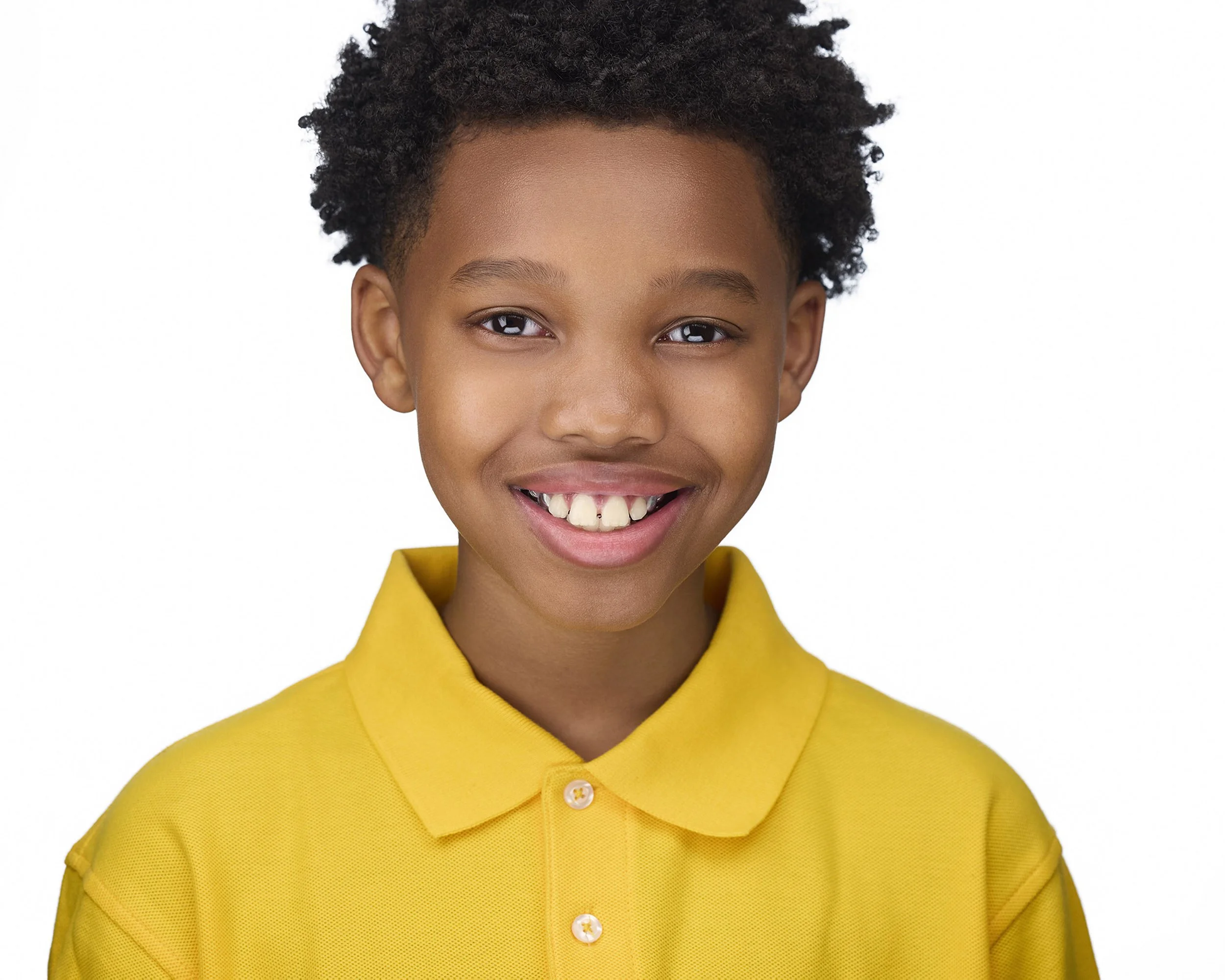 young male child actor in yellow shirt