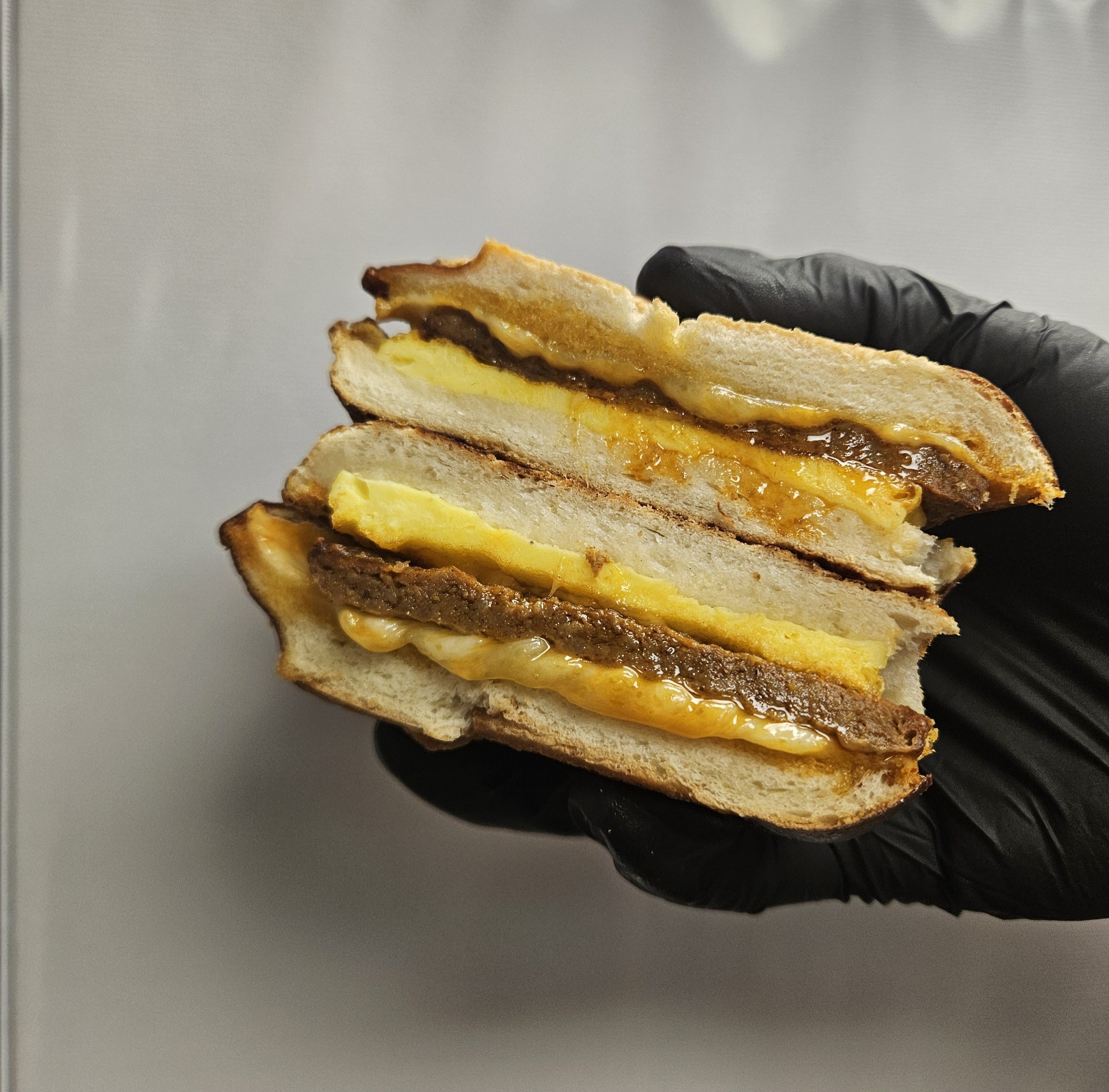 NEW Chorizo Egg and Cheese on Pretzel Bun (WHEAT, DAIRY, EGG, PORK)