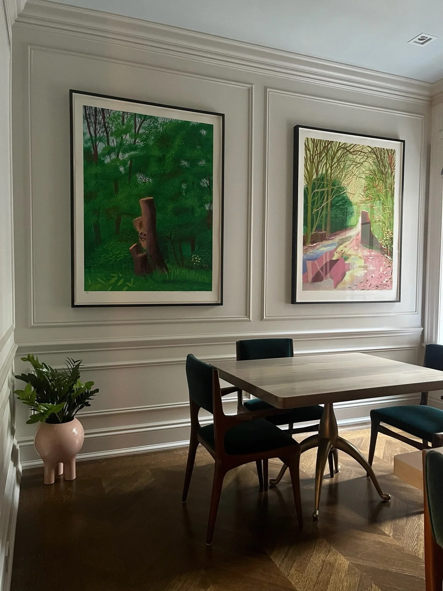 We love when clients let us play with interesting vessels. This home is full of unique ceramic pieces, and we felt this pink three-legged planter would fit right in while complementing the artwork above. We chose a ZZ plant for its low-light adaptabi