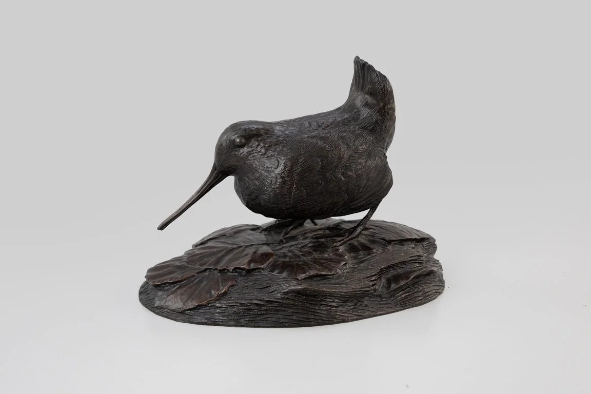 Jim Foote (1925-2004), Woodcock in Leaves, bronze, 7 by 10 by 6 1/2 in.