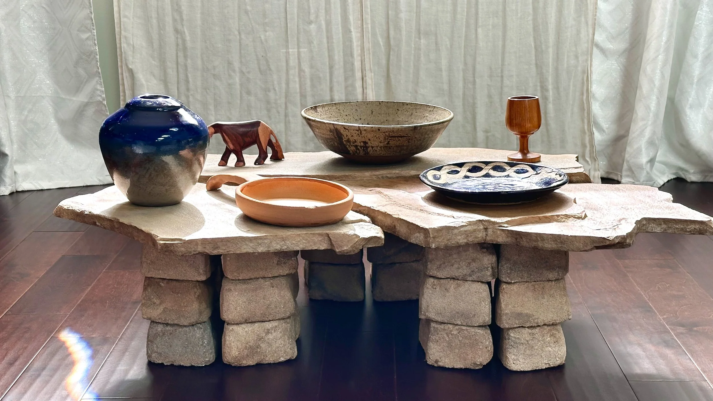 stone coffee table with garden brick legs