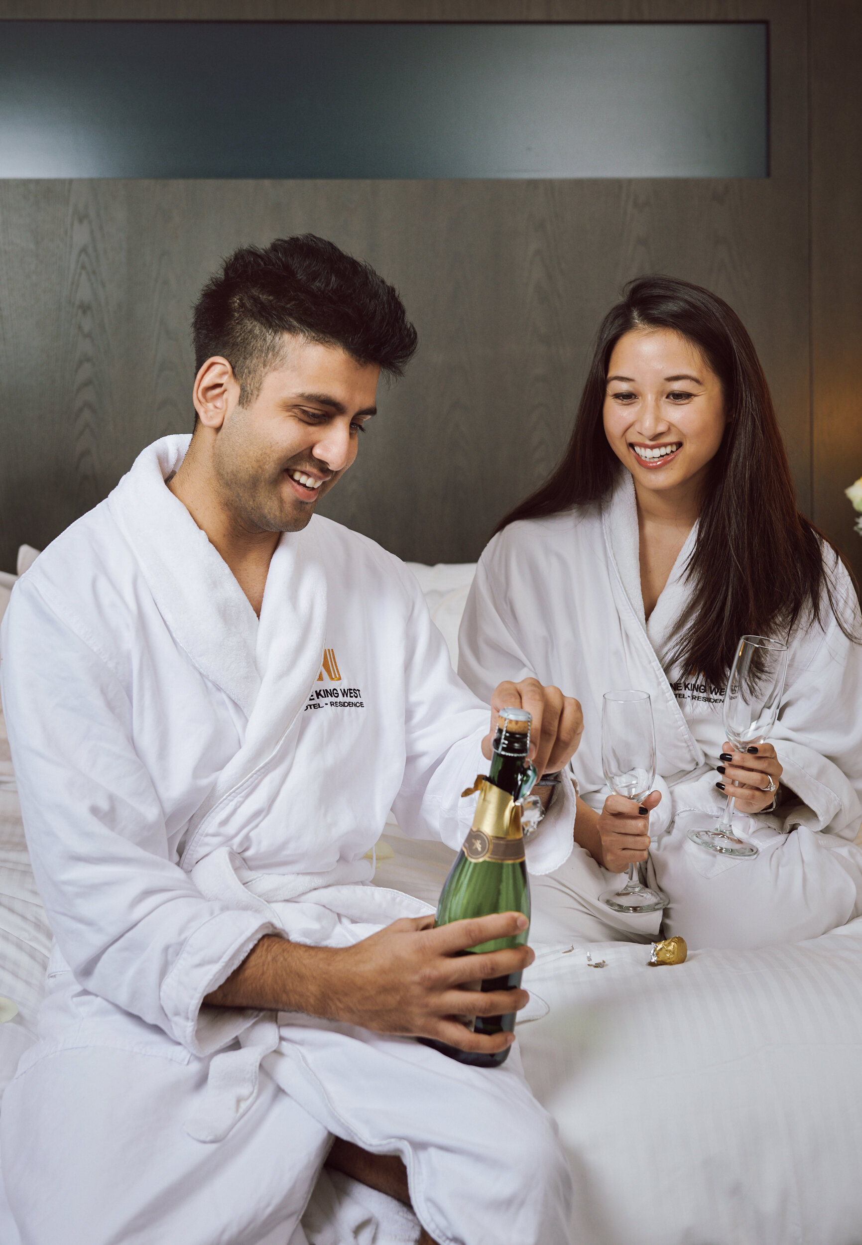toronto-vancouver-commercial-photographer-onekingwest-hotel-couple-celebrating-01.jpg