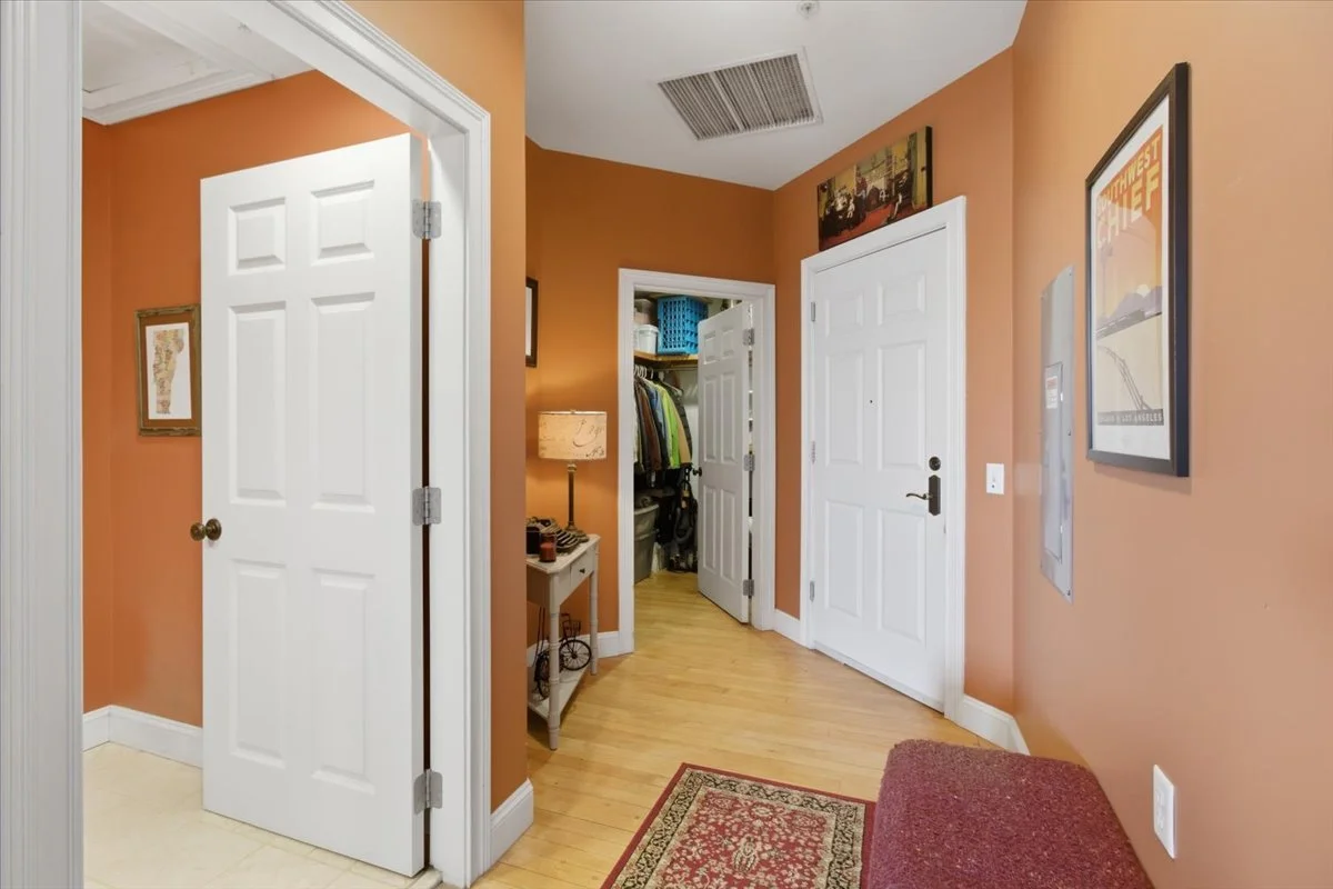 Entryway including large, walk-in closet and half bath