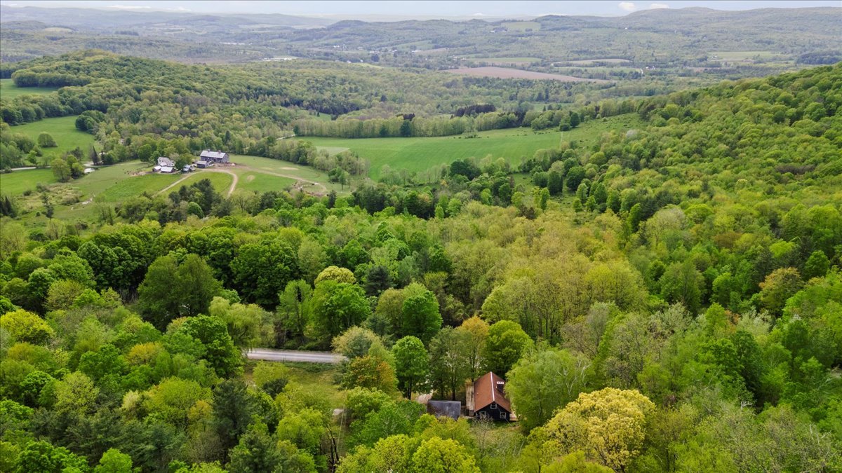 arial view of property and surrounding area.