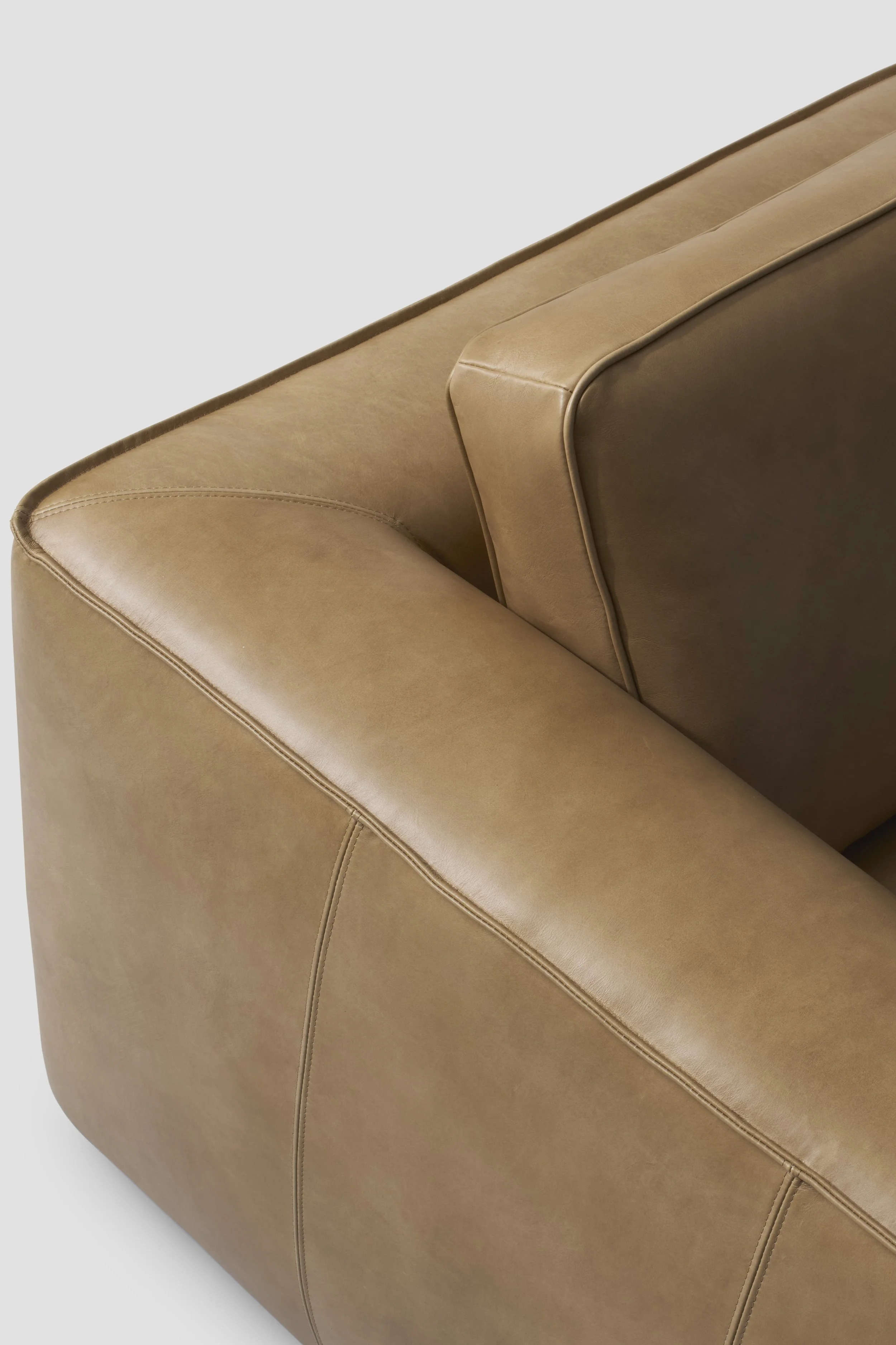 Brown leather sofa detailing
