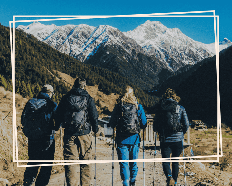 A Group of Hikers walking towards a mountain