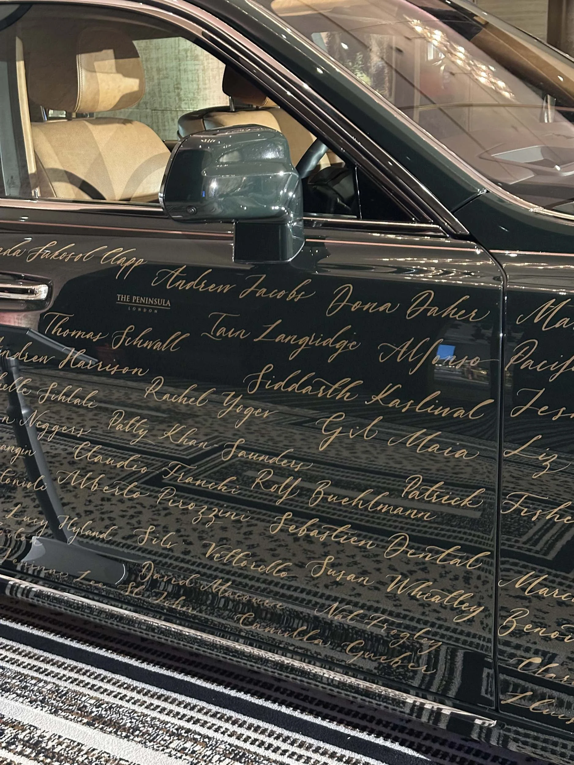 peninsula-london-50-best-hotels-guest-names-car-calligraphy.jpg
