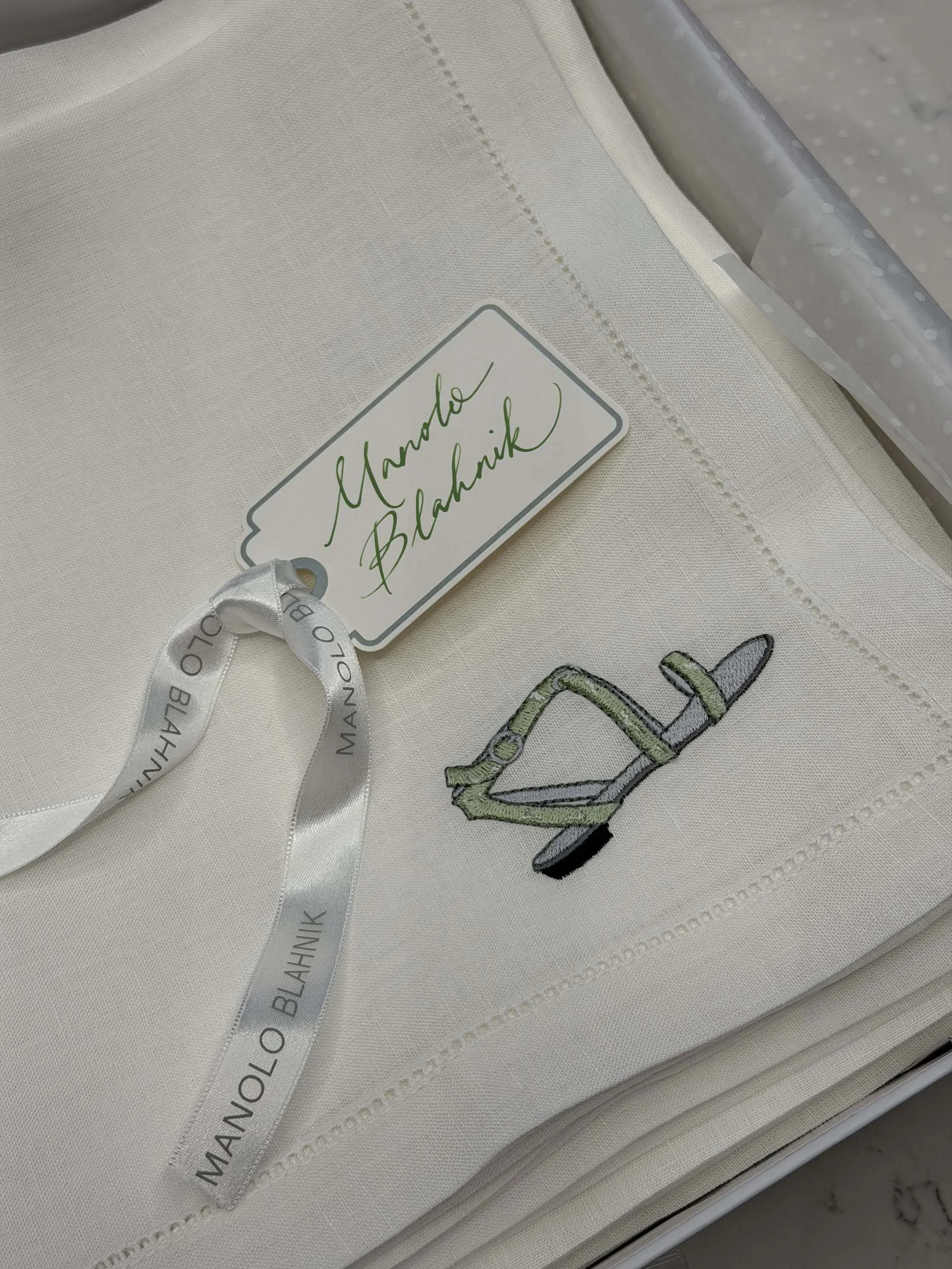 manolo-blahnik-embroidered-napkin-calligraphy-tag.jpg