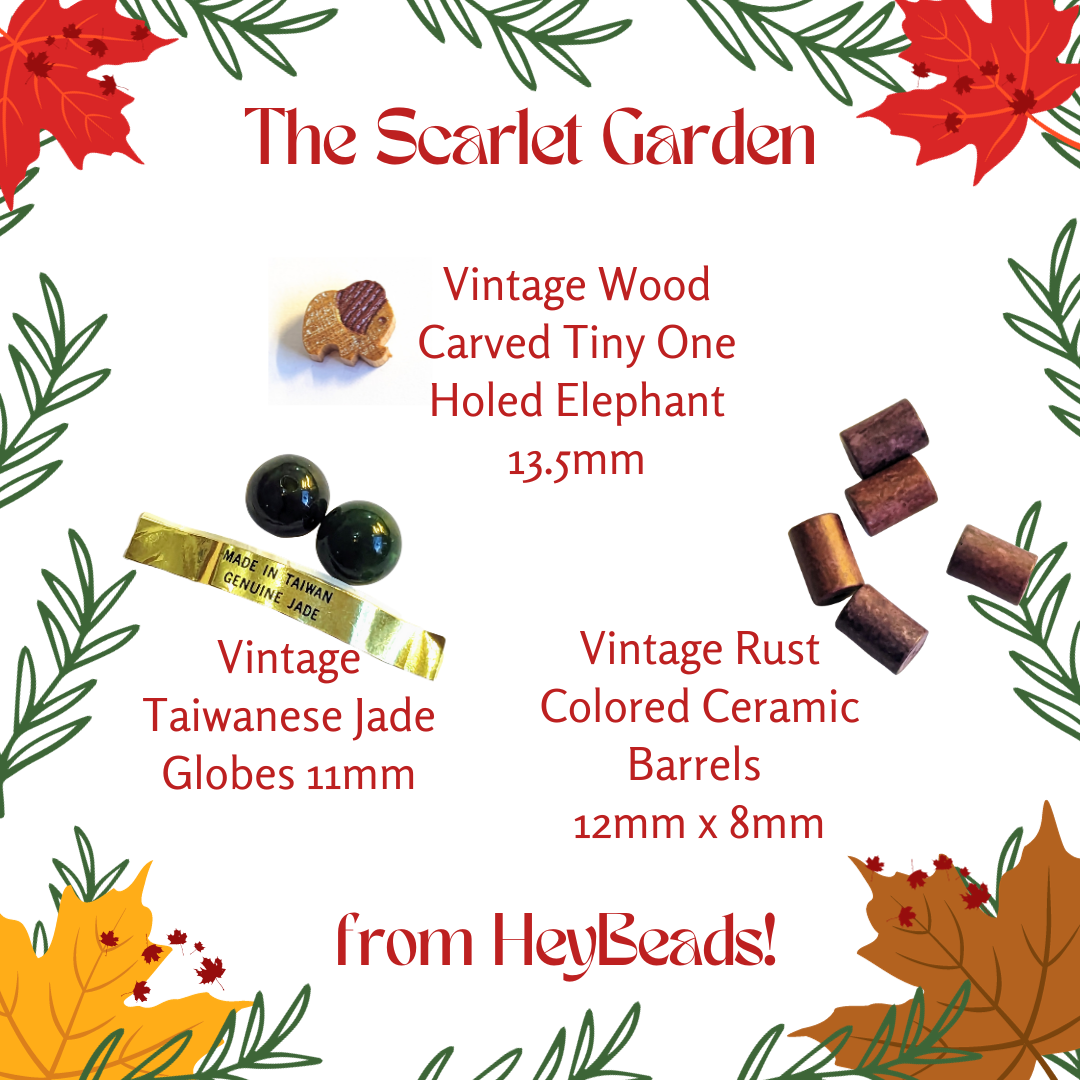 Promotional graphic by HeyBeads called 'The Scarlet Garden,' featuring vintage beads and charms. Items displayed include a carved wooden elephant charm, vintage Taiwanese jade globes, and rust-colored ceramic barrels, with decorative leaf designs in the corners.