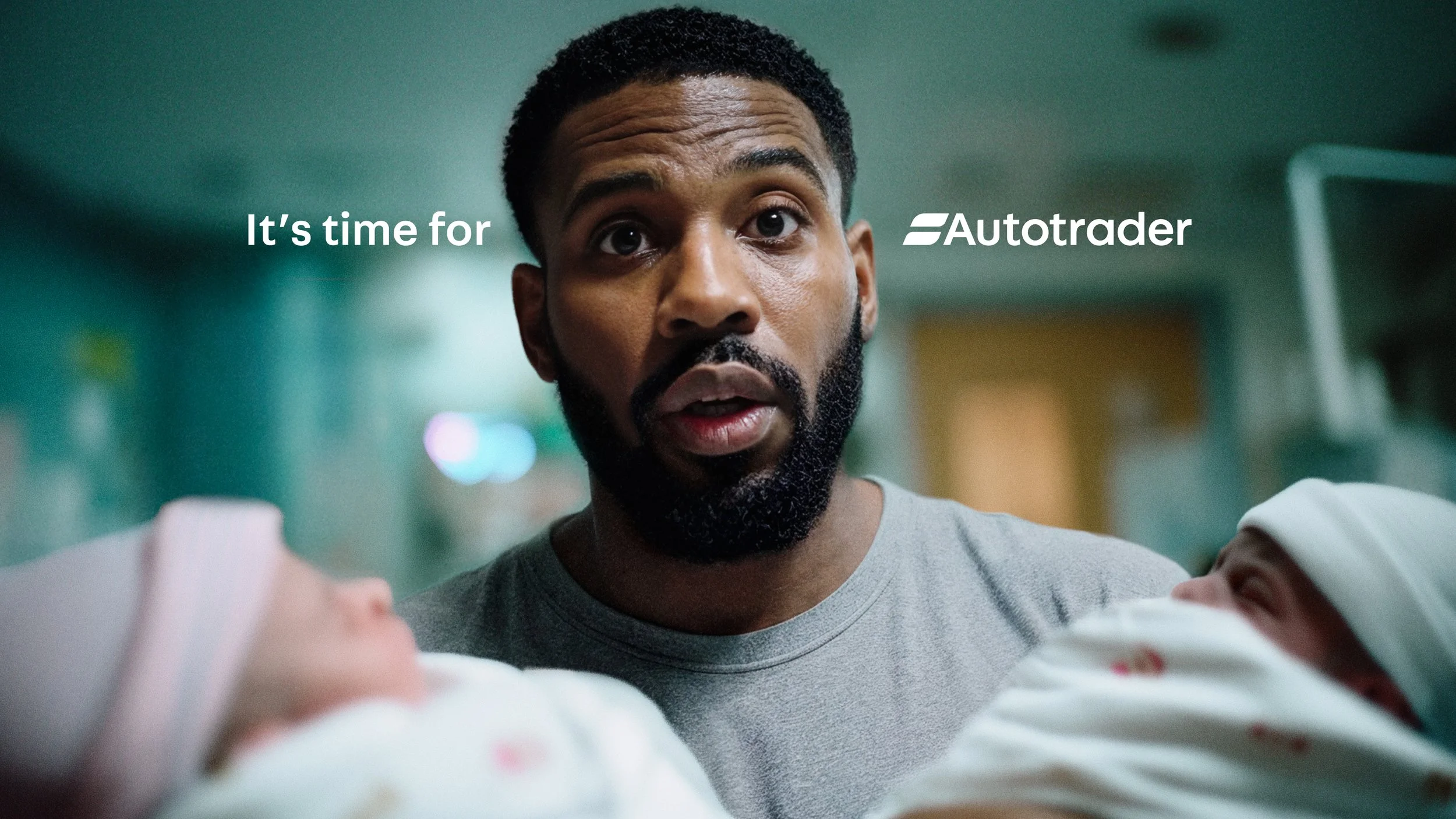It's time for Autotrader - Man holding two babies