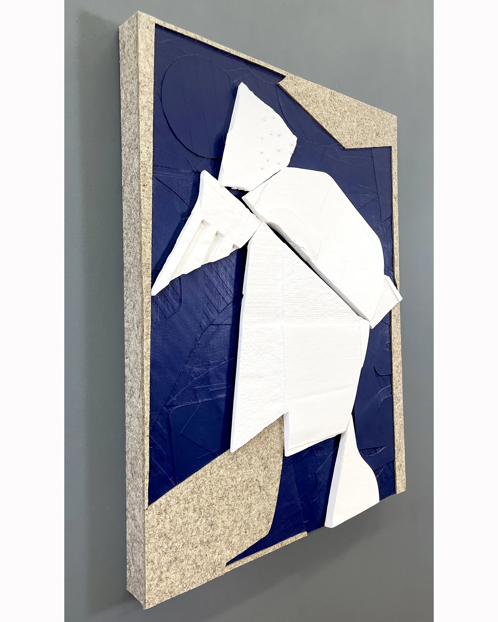 Blue Bird. 2025. Casting Plaster, acrylic paint, industrial wool felt on wood panel. 18" x 24" x 2"