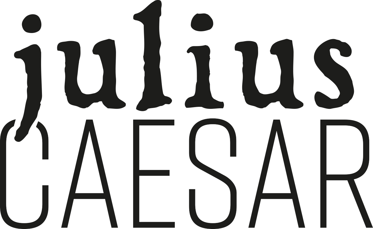 Black logo for the title of Julius Caesar.