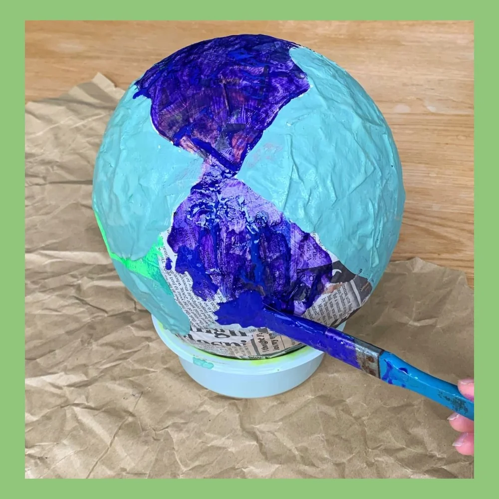 Paper mache globe It's Our Too
