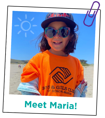 Young girl at the beach wearing glasses - Meet Maria!