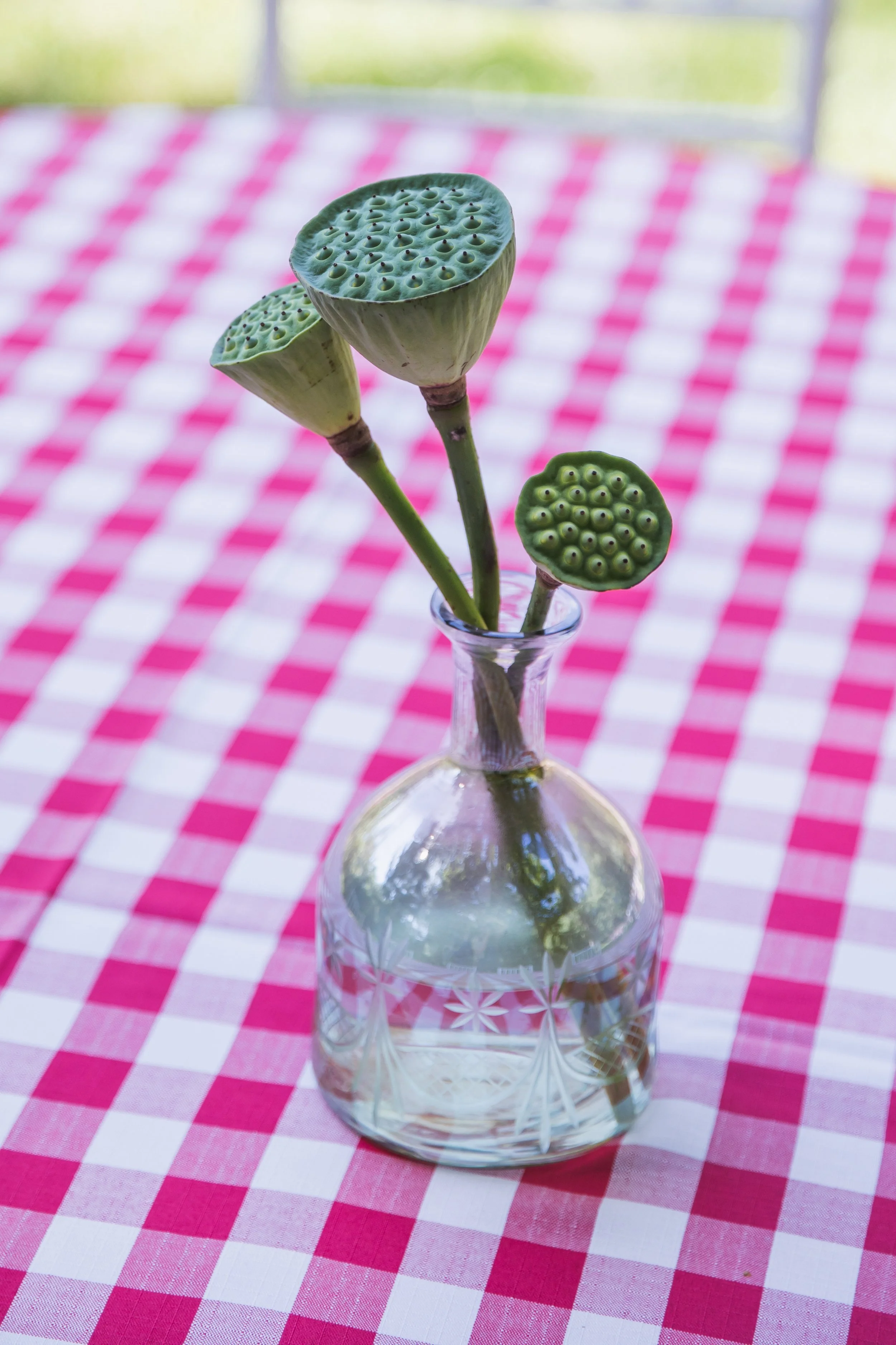 Small bud vase with botanicals