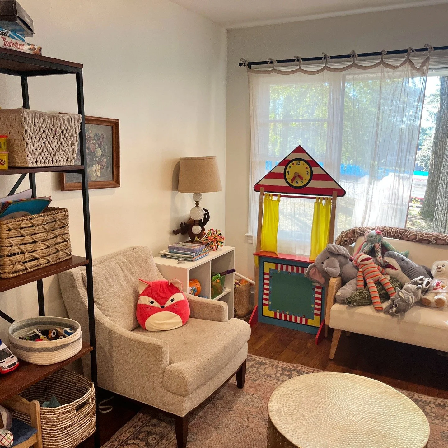 A peek inside one of our playrooms! 
Play therapy rooms offer a non-threatening, consistent, and nurturing space for children to explore their feelings and experiences. Each room is equipped with specific toys and materials that act as a child's &qu