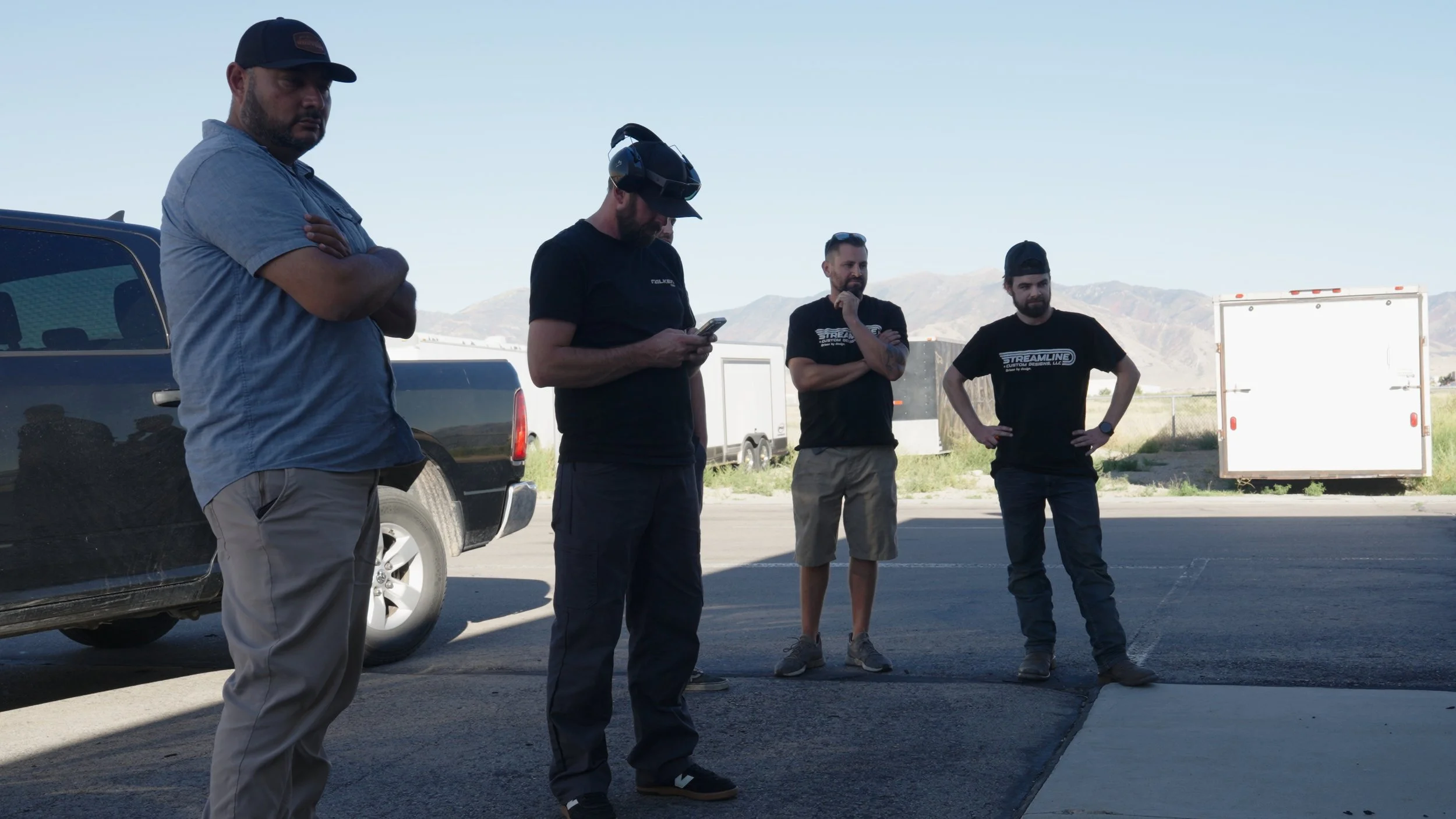 Streamline team discussing final strategy before Barrett-Jackson Cup competition outside Salt Lake City workshop