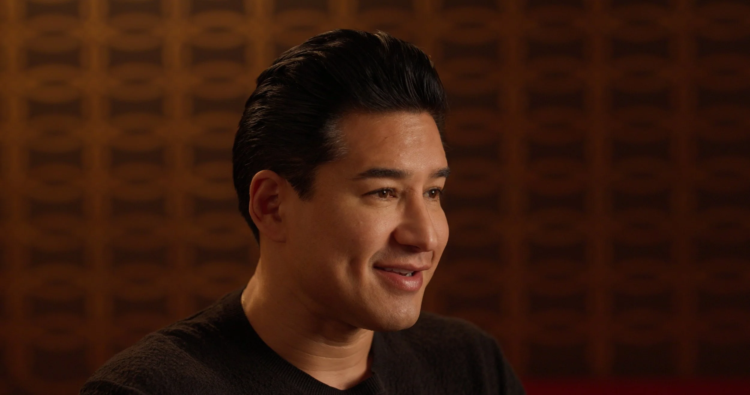 Close-up documentary interview shot of Mario Lopez filmed for the MC Magic documentary before the live performance